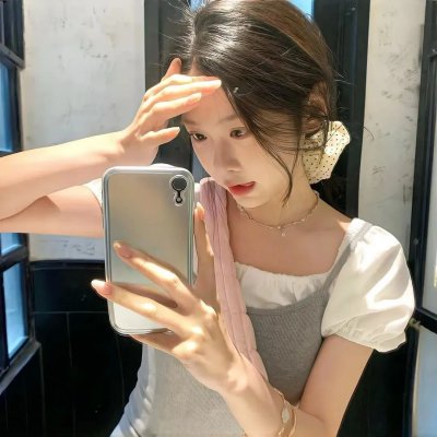 桃花含露又春风